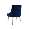 A luxury dining chair by Liang & Eimil with a classic design, brass detailing and a beautiful blue velvet upholstery