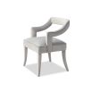 A sophisticated dining chair by Liang & Eimil with a gorgeous grey upholstery and open back design