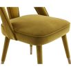 Upholstered mustard chair with lavish velvet and tapered legs