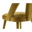 Upholstered mustard chair with lavish velvet and tapered legs