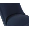 Blue velvet dining chair accented with golden-capped tapered legs