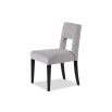 Light grey dining chair with square cut out shape in backrest and luxurious linen upholstery