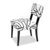 Black and white dining chair upholstered in modern graphic printed fabric