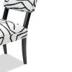 Black and white dining chair upholstered in modern graphic printed fabric