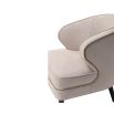 Velvet beige armchair boasting beautiful curves, tapered wenge wood legs and nail head trim accent