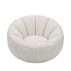 Statement boucle sand swivel chair with enveloping shell-shaped backrest