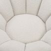 Statement boucle sand swivel chair with enveloping shell-shaped backrest