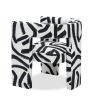 Armchair with black and white graffiti-style print and open sides