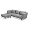 A modern sofa by Liang & Eimil with a gorgeous grey upholstery