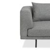 A modern sofa by Liang & Eimil with a gorgeous grey upholstery