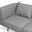 A modern sofa by Liang & Eimil with a gorgeous grey upholstery