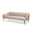 A stylish sofa by Liang & Eimil with a lovely soft velvet upholstery