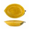 A ceramic serving bowl shaped like a lemon, with textured finish 