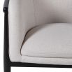 Beige armchair with black outline structure