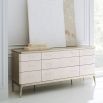 Chic and striking dresser with nine drawers and champagne accents