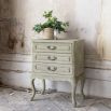 Three drawer classic design bedside table with ornate detailing