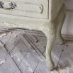 Three drawer classic design bedside table with ornate detailing