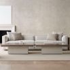 A contemporary coffee table by Caracole with a modern design, clean lines and a travertine stone top