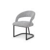 Sleek dining chair with bronze finish base and luxuriously sumptuous seat