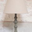 Traditional, slim, grey side lamp with cream linen shade