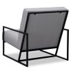 Grey chair with gently reclined backrest, padded seats and black legs