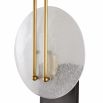 Elegant sconce light with slim brass metalwork and frosted grass