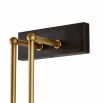 Elegant sconce light with slim brass metalwork and frosted grass