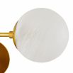 Wall sconce with four glass globes feature lights fitting in a gold frame