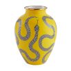Yellow vase with black and white snakes