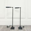 Set of two sleek black floor lamps