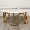 Round marble topped coffee table with gold wiggly legs