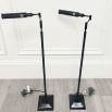 Set of two sleek black floor lamps