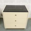 Ivory coloured three drawer bedside table with chocolate coloured details