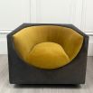 Mustard chair with curvaceous tailoring in its dipped seat design