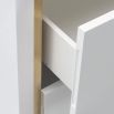 High gloss white lacquer chest of drawers with brass frame