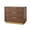 Light brown chest of drawers with brass handles and base