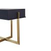 A sophisticated bedside table by Liang & Eimil with a black and brass finish