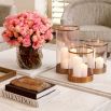 Golden textured candle holder with clear glass surround