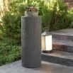 Elevate your outdoor spaces with the Davos Outdoor Pedestal, combining modern design and durability for a stylish and functional addition to any patio.