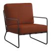 Armchair with slender metal frame and rectangular boucle finish cushions