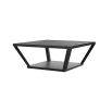 Black coffee table with larger, textured top and smaller base