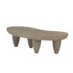 Kidney-shaped outdoor coffee table with smooth top and carved underside