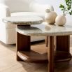 Tiered coffee table with walnut wood base with shelves wrapped in a lacquered natural eggshell.