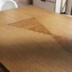 Large rectangular dining table with carved detailed base