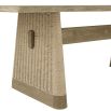 Rectangular teak dining table with two wide rattan legs and a supporting beam