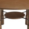 Circular wooden finish dining table with ribbed detailing and bronze finished fixings.