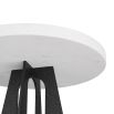 White marble side table with intersecting planes of blackened iron pedestals