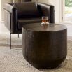 Circular side table in antique bronze finish