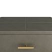 Waterfall-edged side table in sleek topstitched graphite leather and brass handle