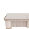 Smoke beechwood desk with tapered legs, bullnose edge and stitched ivory leather surface